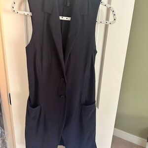 Stylish, chic long navy vest by Porto. Wear with leggings and boots or jeans.